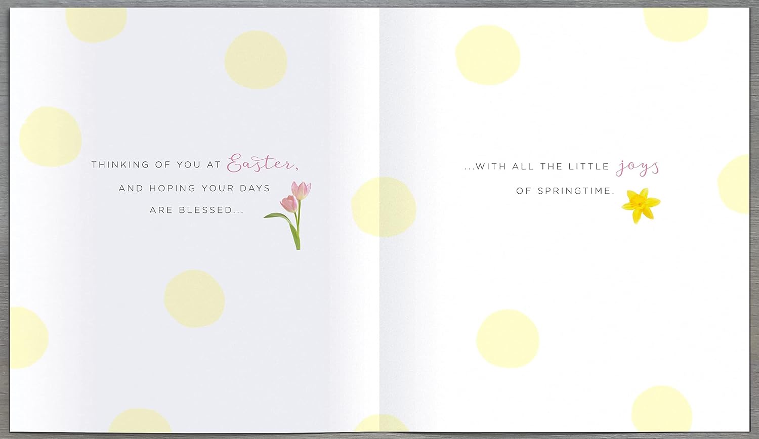 Easter greeting card from Carlton Cards featuring a cross design with foiled and embellished details.