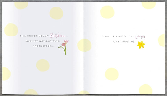 Easter greeting card from Carlton Cards featuring a cross design with foiled and embellished details.