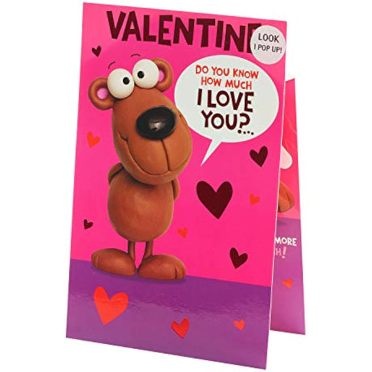 Colorful cartoon pop-up Valentine's Day greeting card by UK Greetings featuring vibrant heart and character illustrations inside.