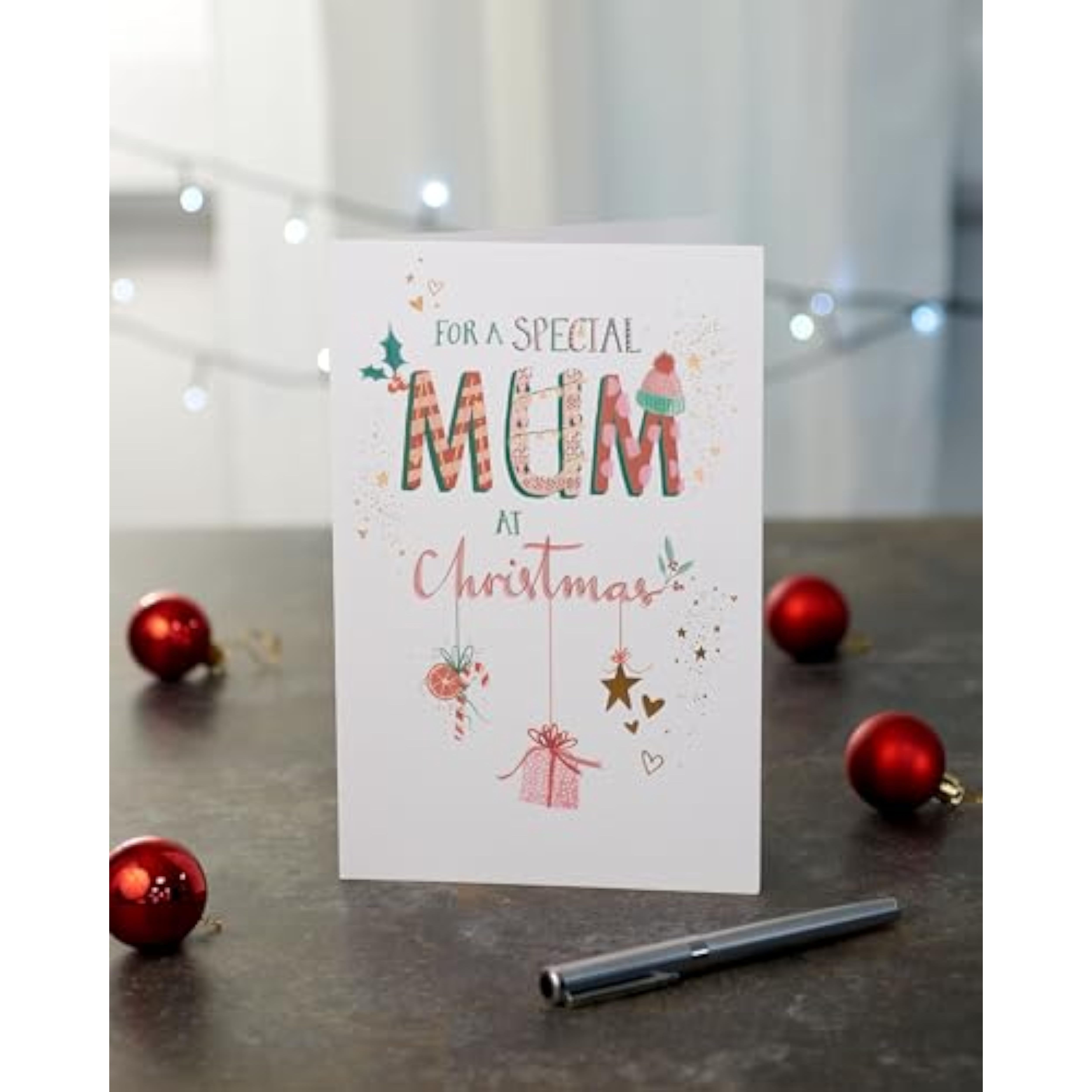 Christmas greeting card for mum with hanging ornament foil design, UK Greetings festive holiday greeting card.