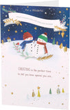 Cute snowman hugging a grandson on a Christmas greeting card by UK Greetings, featuring festive holiday artwork.