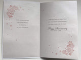 Elegant die-cut pearls anniversary greeting card featuring a special couple design, from UK Greetings, with luxurious details.