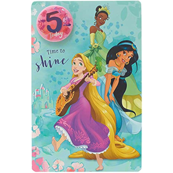 Disney Princess 5th birthday greeting card with badge from UK Greetings, featuring colorful princess illustrations and festive design.