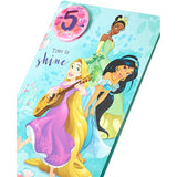 Disney Princess 5th birthday greeting card with badge, featuring colorful princess illustrations and celebratory design.