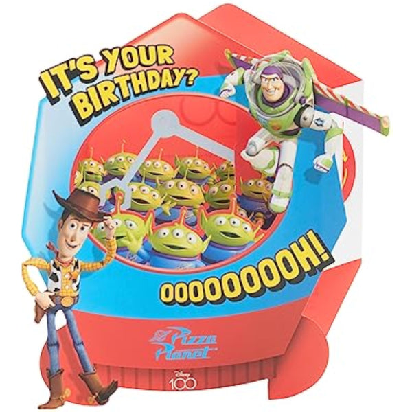 3D Toy Story birthday greeting card featuring a grabber machine design from UK Greetings, with colorful Toy Story-themed artwork.