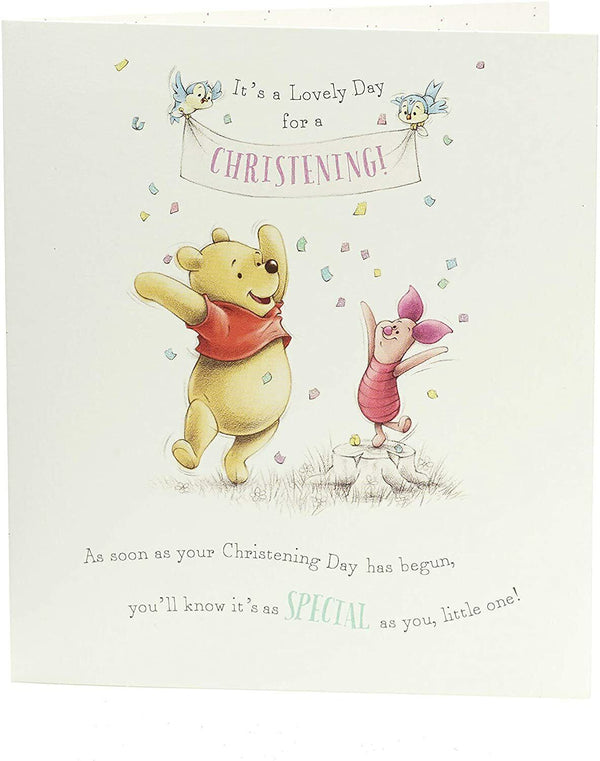 Disney Winnie the Pooh christening greeting card featuring Pooh Bear with balloons and soft pastel background.