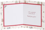 Disney Winnie the Pooh grandson Christmas greeting card with festive tree design, featuring colorful holiday illustration from UK Greetings.