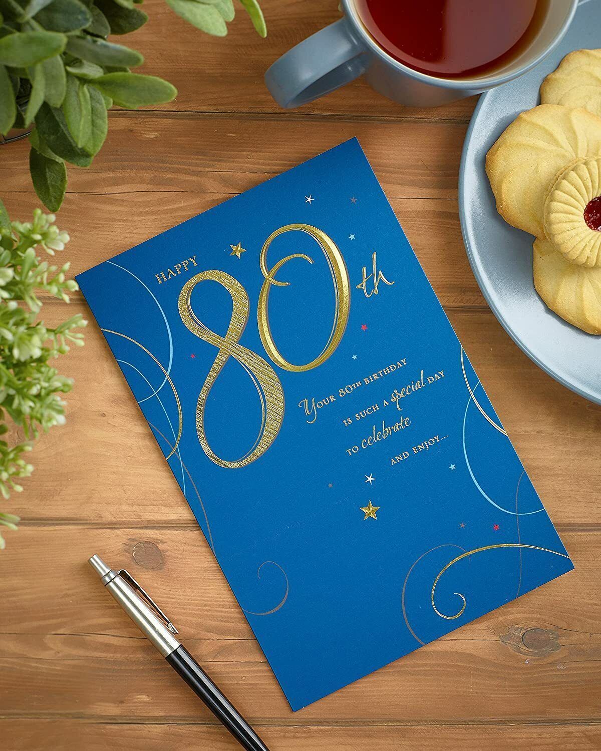 Elegant 80th birthday milestone greeting card by UK Greetings featuring stylish design and festive details.