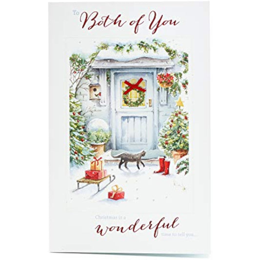 Elegant UK Greetings Christmas greeting card for couples featuring glitter accents and a decorative bow.