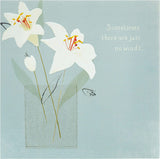 Elegant lilies sympathy greeting card by UK Greetings featuring a floral design suitable for conveying condolences.