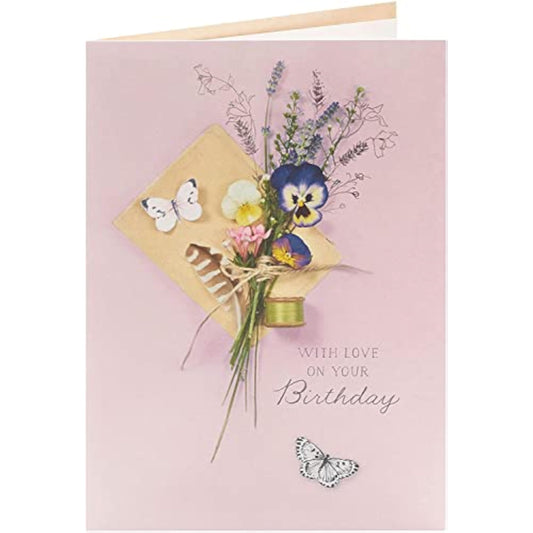 Embossed floral into the meadow birthday greeting card with colorful flower designs on textured paper.