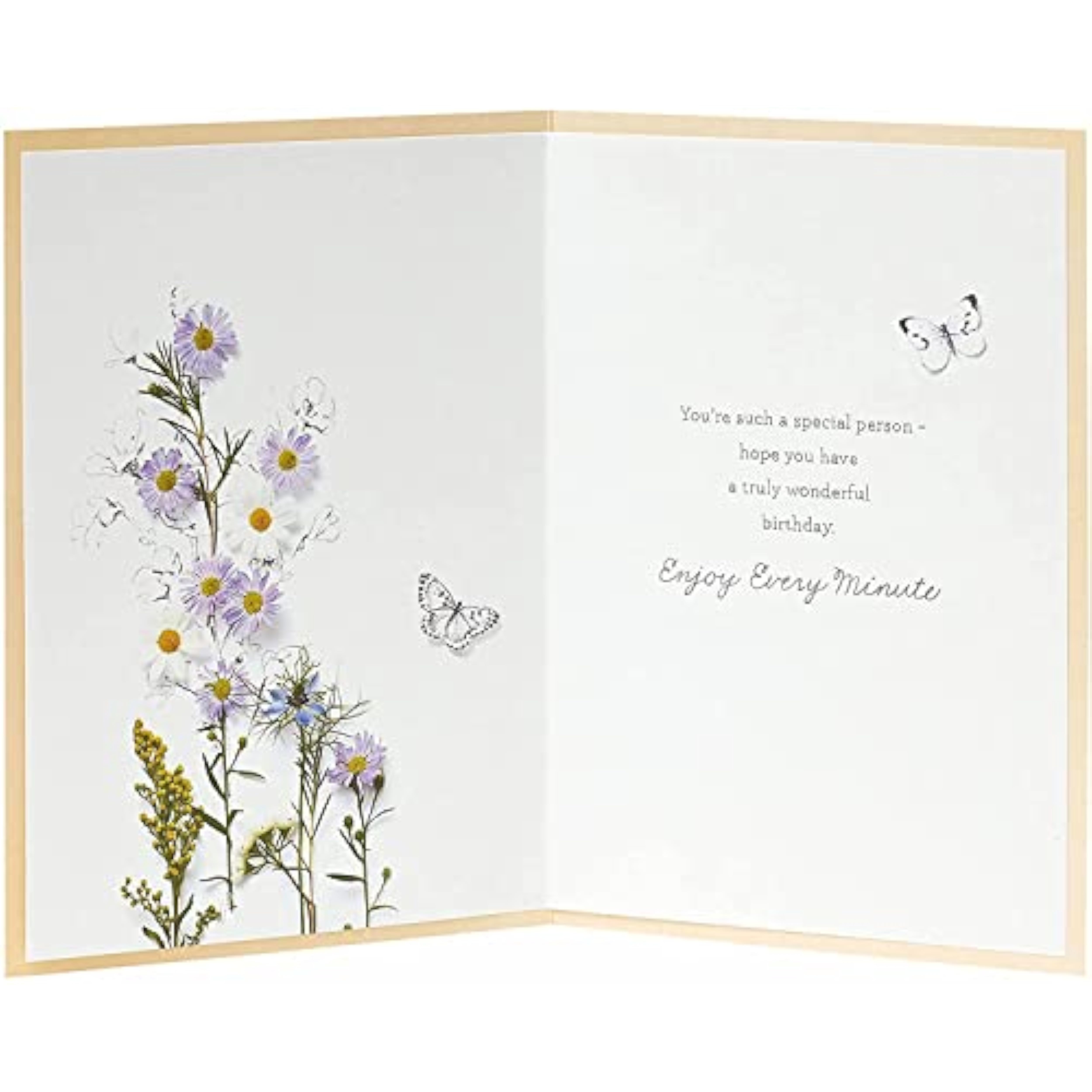 Embossed floral birthday greeting card with meadow design from UK Greetings featuring colorful flowers and intricate details.