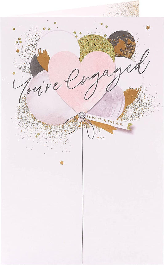 UK Greetings engagement congratulations greeting card with floral design and heartfelt message, perfect for celebrating a special engagement.