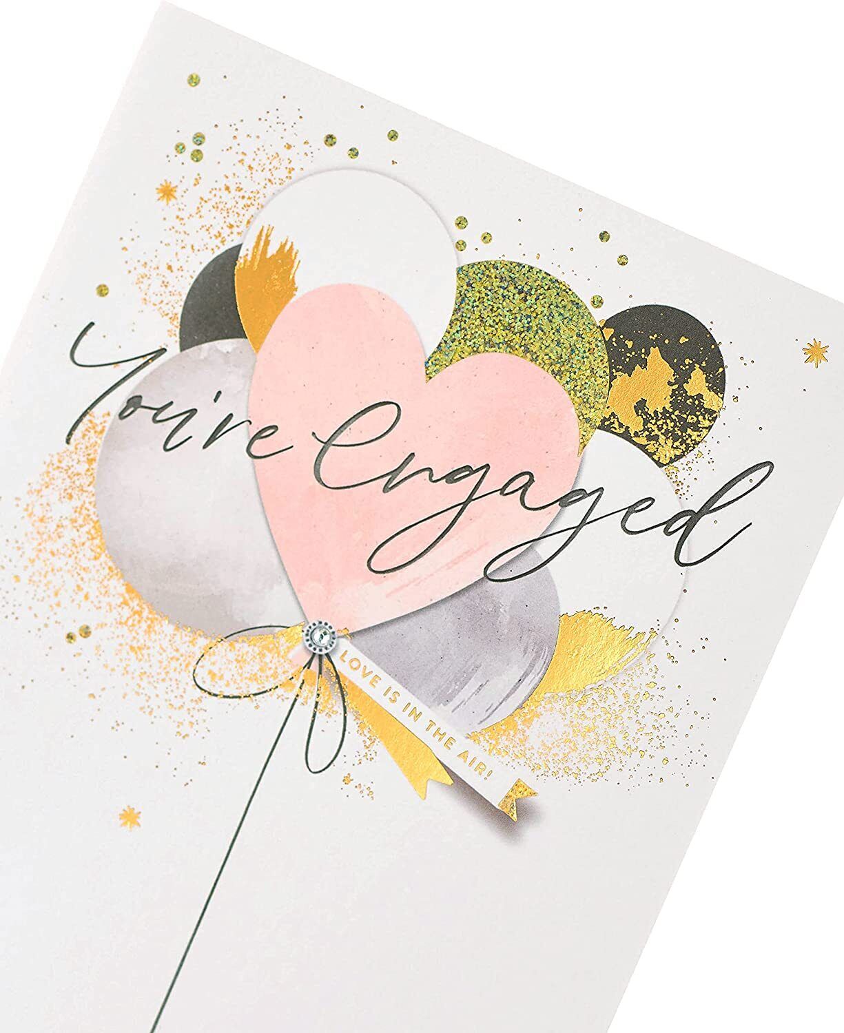 UK Greetings engagement congratulations greeting card with elegant design, perfect for celebrating a couple's special moment.