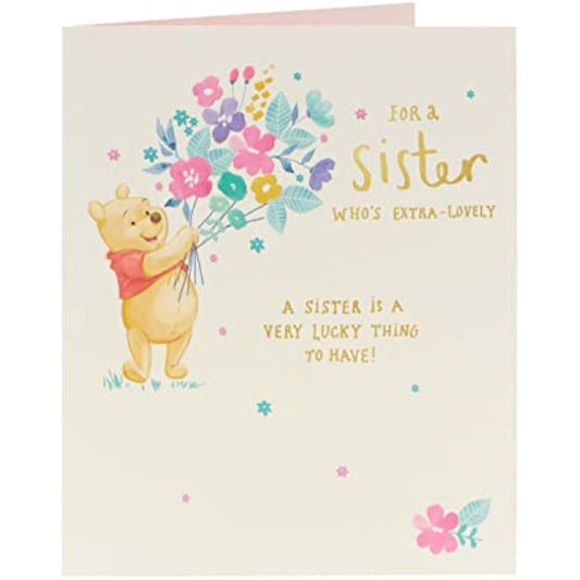 Disney Winnie the Pooh birthday greeting card featuring flowers and "Extra Lovely Sister" message from UK Greetings.
