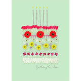 Floral cake design birthday wishes greeting card featuring meadow flowers, by UK Greetings, with colorful floral illustrations.
