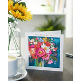 Floral painted get well soon greeting card by UK Greetings featuring colorful floral artwork and uplifting message.