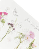 Floral Pretty Birthday Card by UK Greetings featuring meadow flowers and colorful botanical design on a greeting card.