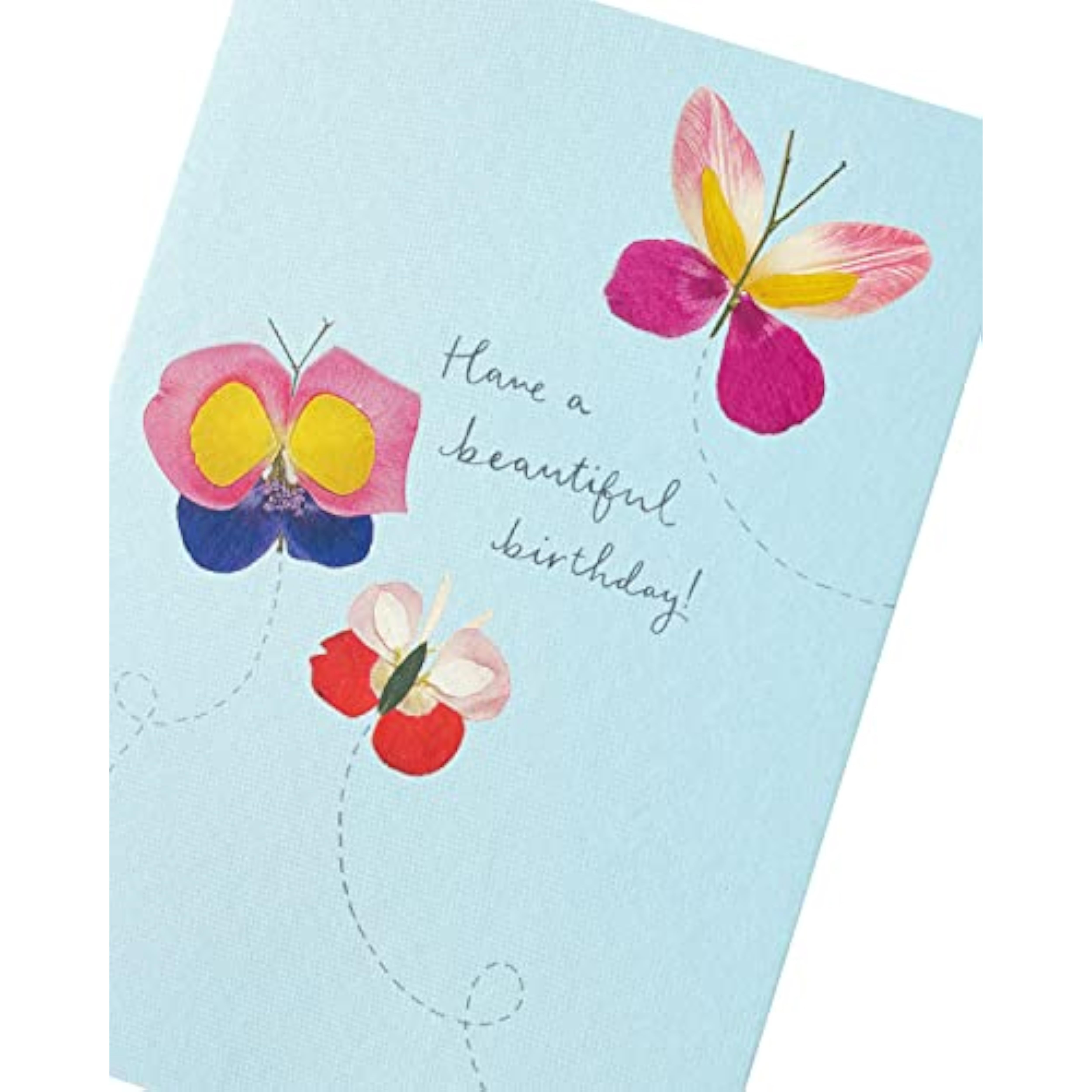 Flower petal butterflies on a Meadow Range birthday greeting card by UK Greetings, featuring colorful floral and butterfly illustrations.