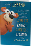 Humorous greeting card for husband's birthday from UK Greetings, featuring funny illustrations and message on front.