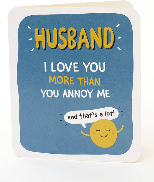 Humorous greeting card for husband with funny birthday message, UK Greetings brand, featuring playful design and cheerful colors.