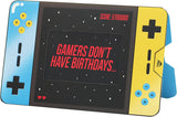 Open male birthday greeting card featuring game design elements from UK Greetings, with colorful illustrations and playful graphics.