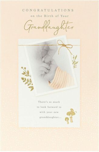 Gold foil greeting card featuring a heartfelt message for a new granddaughter, from UK Greetings. Bright, elegant design with gold accents.