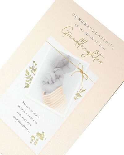 Gold foil greeting card for granddaughter from UK Greetings, featuring a floral design and heartfelt message inside.