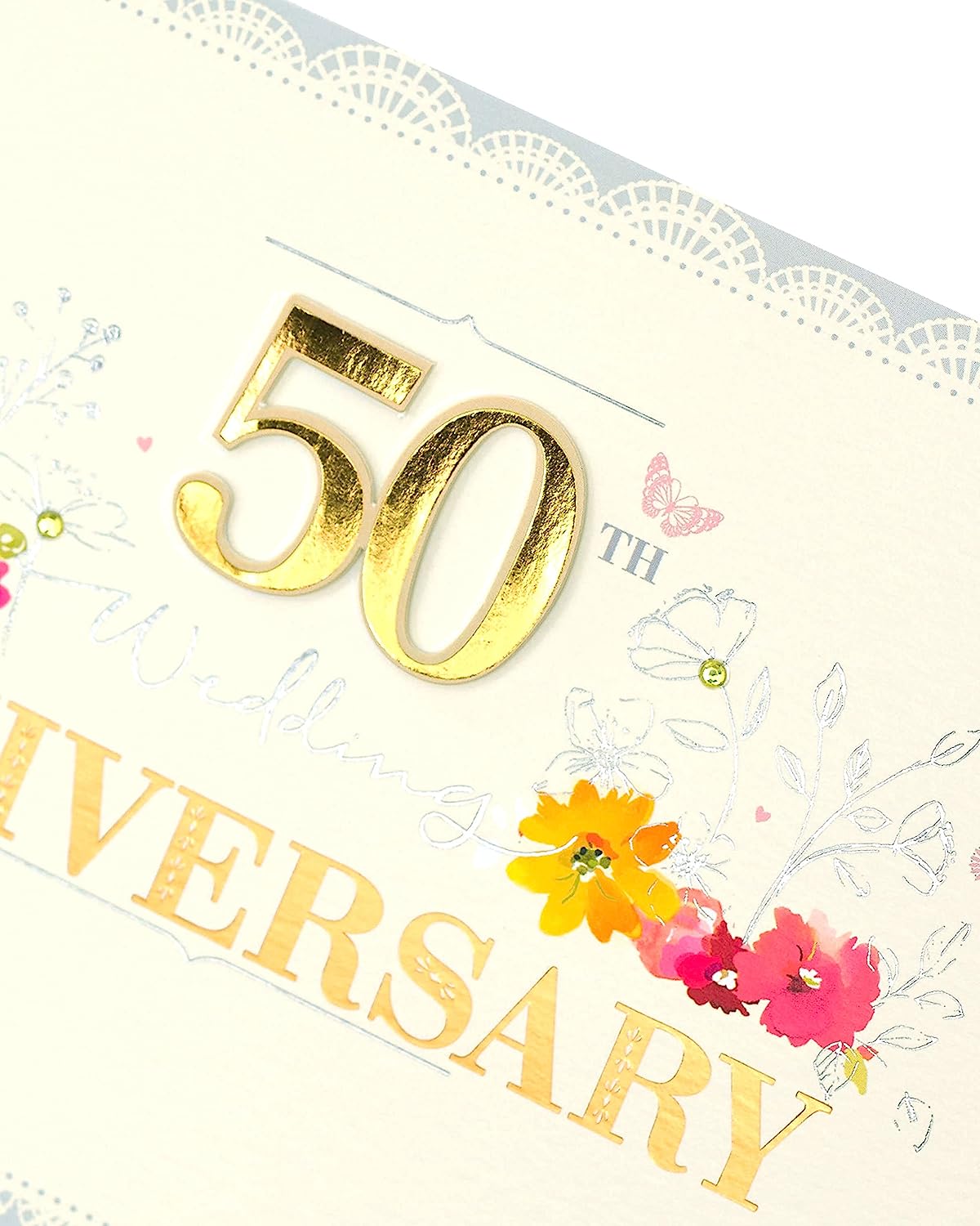 Golden Moments 50th Anniversary greeting card by UK Greetings featuring elegant gold accents and celebratory design.