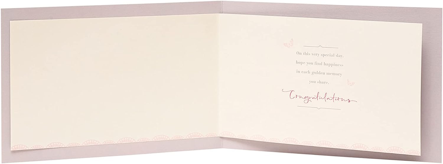 Golden Moments 50th Anniversary greeting card from UK Greetings featuring elegant gold accents and celebratory design.