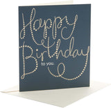 Golden Stars Happy Birthday greeting card from UK Greetings featuring festive star designs and cheerful "Happy Birthday To You" message.
