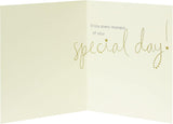 Golden stars birthday greeting card with "Happy Birthday To You" message from UK Greetings, featuring festive star designs.