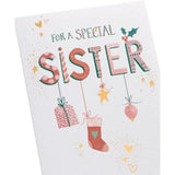 Hanging Christmas ornament themed greeting card for sister by UK Greetings, featuring festive designs and holiday motifs.