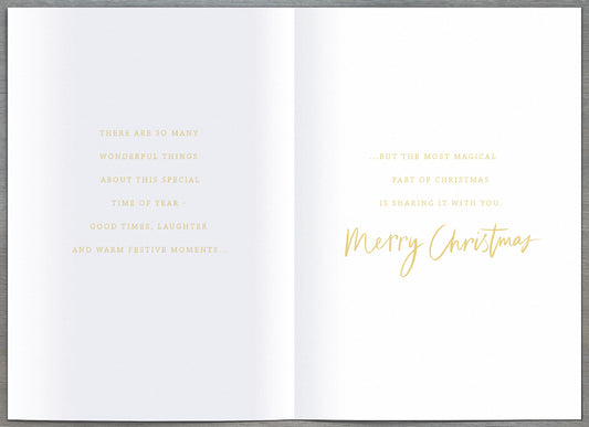 Husband Christmas greeting card featuring a festive Christmas tree city scene and a loving holiday message by UK Greetings.