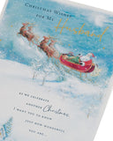 Husband Christmas greeting card featuring Santa in a sleigh with festive design, UK Greetings brand, decorative holiday imagery.