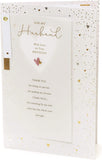 Front of UK Greetings Husband and Dad birthday greeting card with cheerful design and heartfelt message inside.