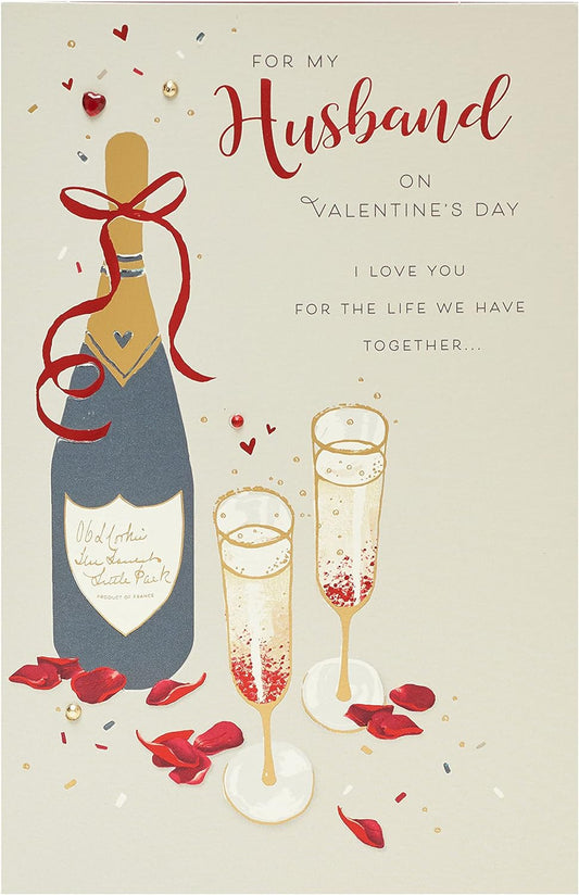 Husband Valentine's Day greeting card with champagne design and envelope from UK Greetings, featuring romantic imagery and elegant details.