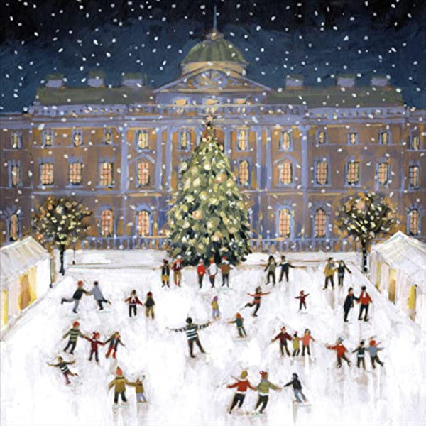 Whimsical winter scene on a Christmas greeting card featuring ice skating, festive decorations, and holiday cheer from UK Greetings.