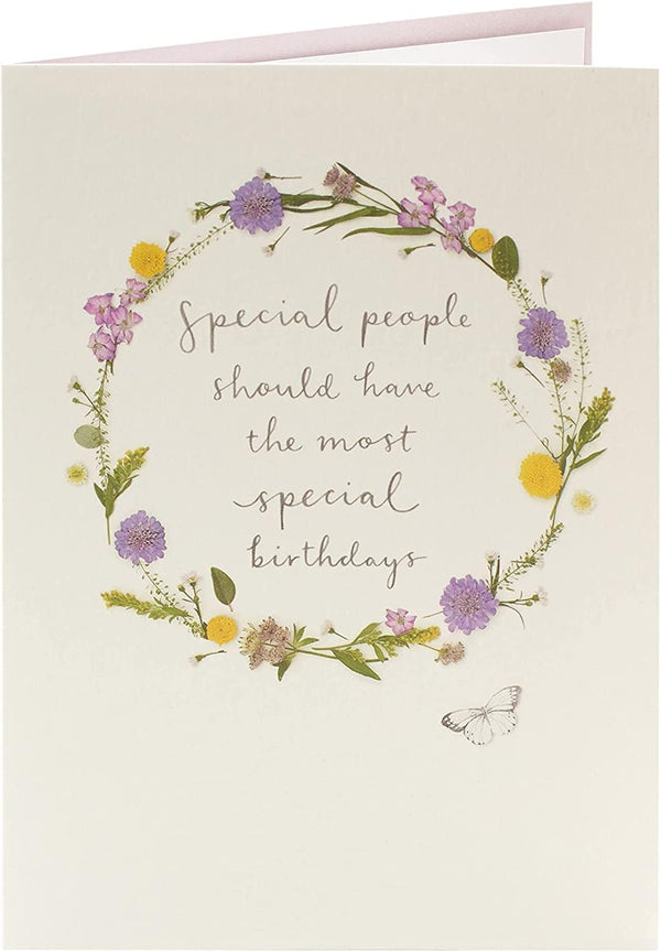 Colorful floral birthday greeting card from the Into The Meadow Range by UK Greetings, featuring vibrant flower designs.