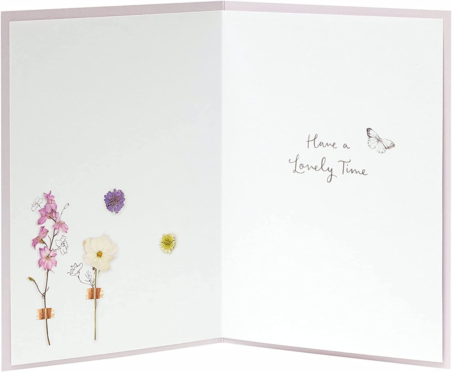 Floral birthday greeting card from the Into The Meadow range by UK Greetings, featuring colorful flower illustrations.