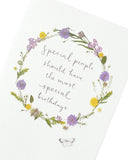 Colorful floral birthday greeting card from UK Greetings' Into The Meadow Range, featuring vibrant flower illustrations.