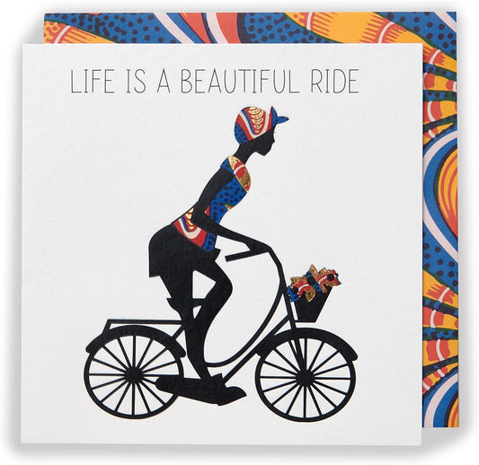 Kindred X Afrotouch greeting card titled "Life Is A Beautiful Ride" featuring colorful floral and abstract design for special occasions.