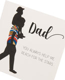 Kindred X Afrotouch birthday greeting card featuring a "Reach For The Stars Dad" message with colorful star illustrations.
