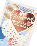 Laser-cut copper husband birthday greeting card with intricate designs, showcasing a unique and elegant UK Greetings product.