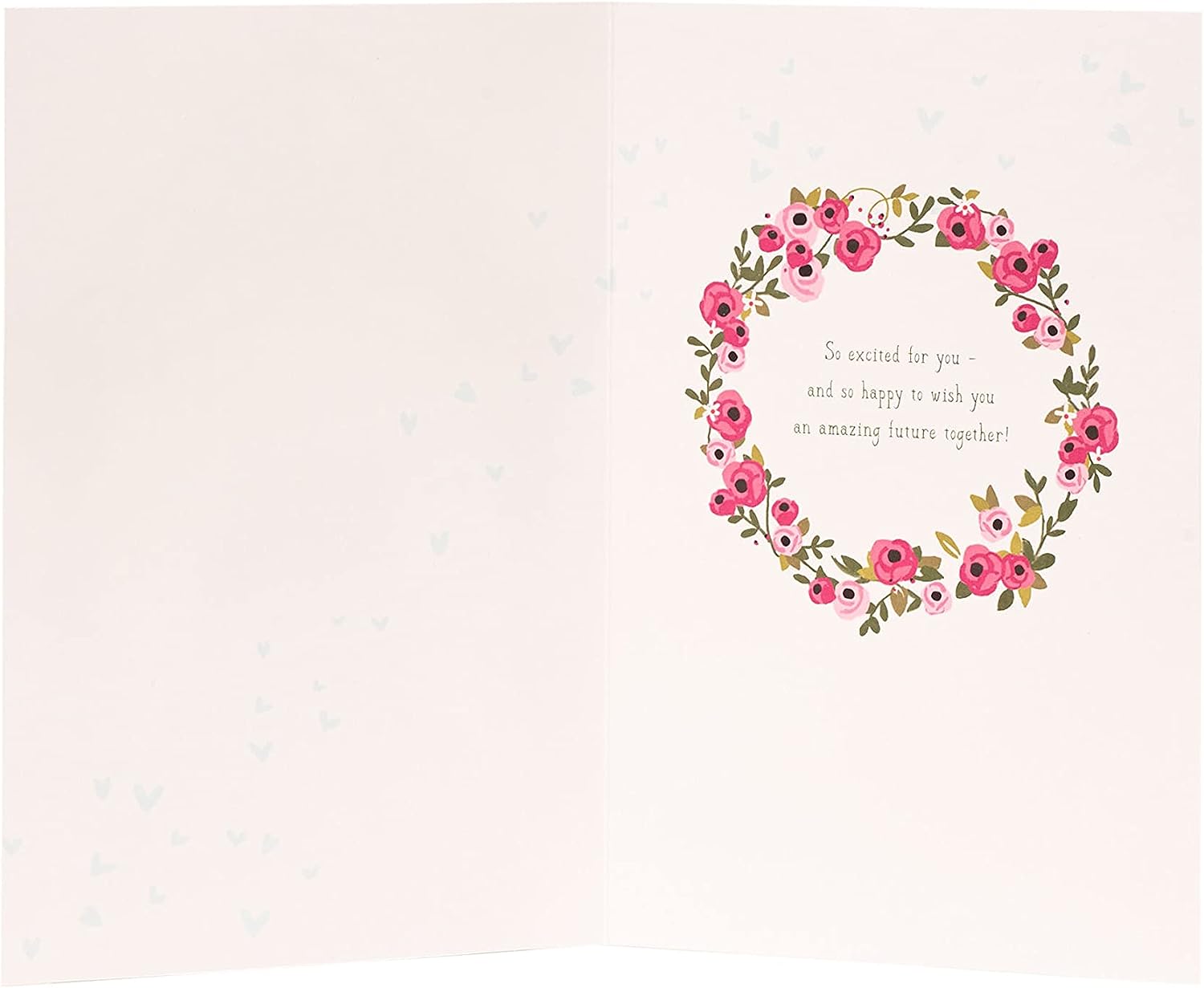 Laser-cut wedding car greeting card by UK Greetings featuring intricate floral and car designs on high-quality cardstock.