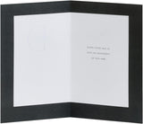 Father's Day greeting card featuring the letter D design by UK Greetings, with colorful illustrations and heartfelt message inside.