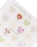 Luxury wedding greeting card by UK Greetings featuring 3D hearts and silver foil embellishments.