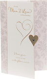 Man I Love Lovely Verse birthday greeting card by UK Greetings with colorful floral design and heartfelt message inside.
