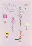 Colorful Meadow Bloom Friend birthday floral greeting card from UK Greetings with vibrant flower illustrations.