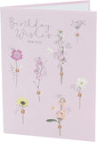 Colorful Meadow Bloom Friend birthday greeting card with floral design from UK Greetings, featuring cheerful flowers and friendly message.